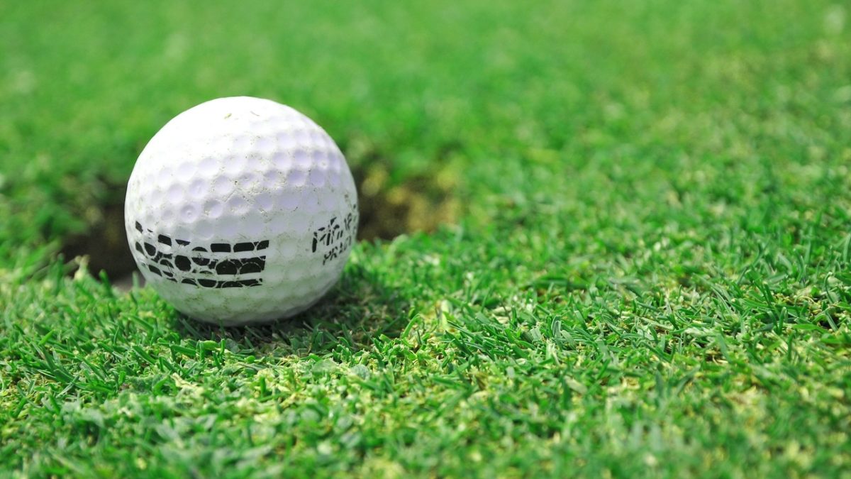 golf ball by Catalin Munteanu