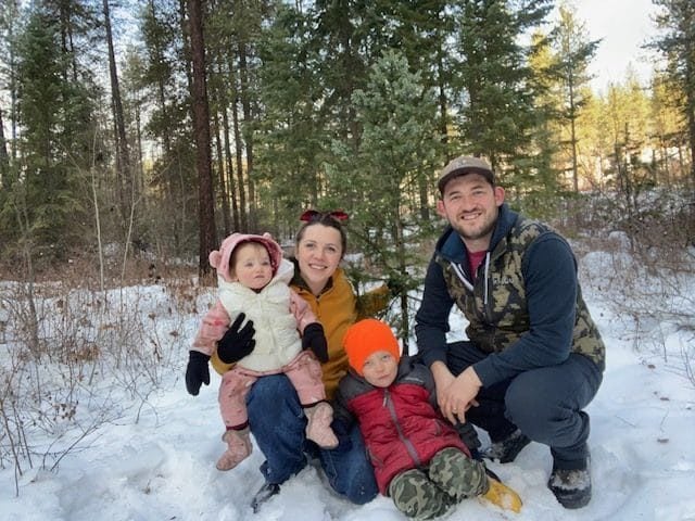 family in snow