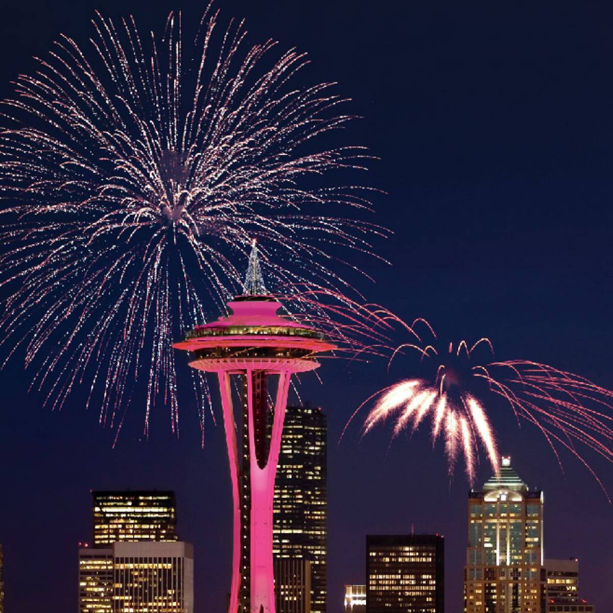 Fireworks bursting over the Space Needle on New Year’s Eve in Seattle