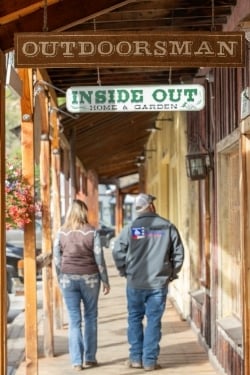 A couple walking on the boardwalk in Winthrop Washington