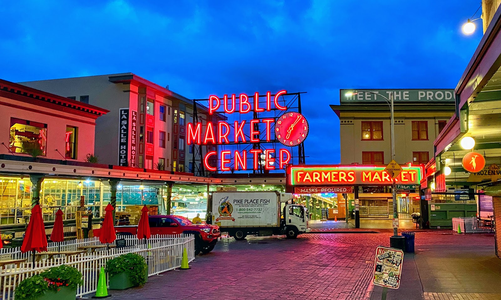 The Public Market Center neon sign at Pike Place Market, home of the Giant Shoe Museum