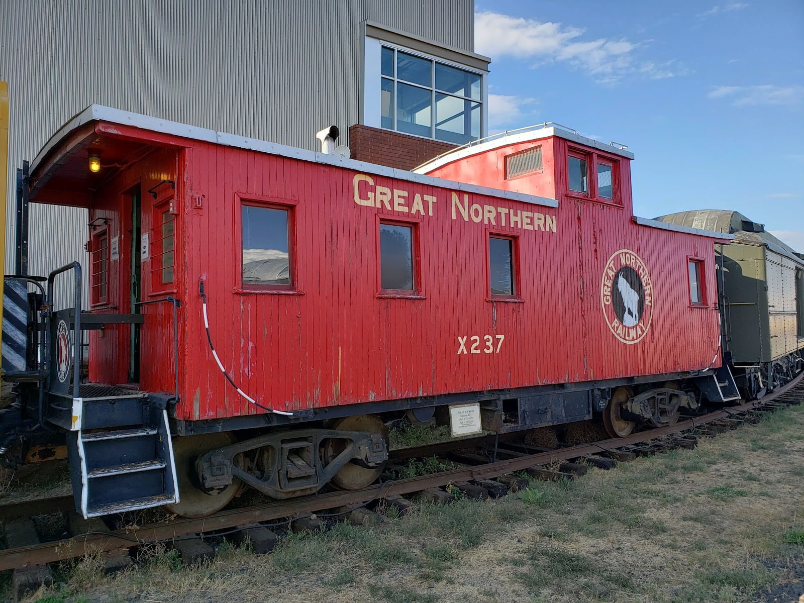 A red Great Northern caboose on display at the Inland Northwest Rail Museum in Reardan