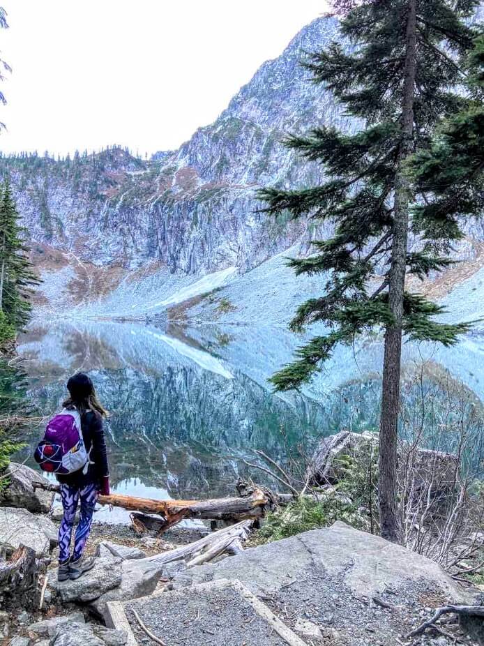 First Day Hikes in Washington State Hiker overlooking a beautiful landscape
