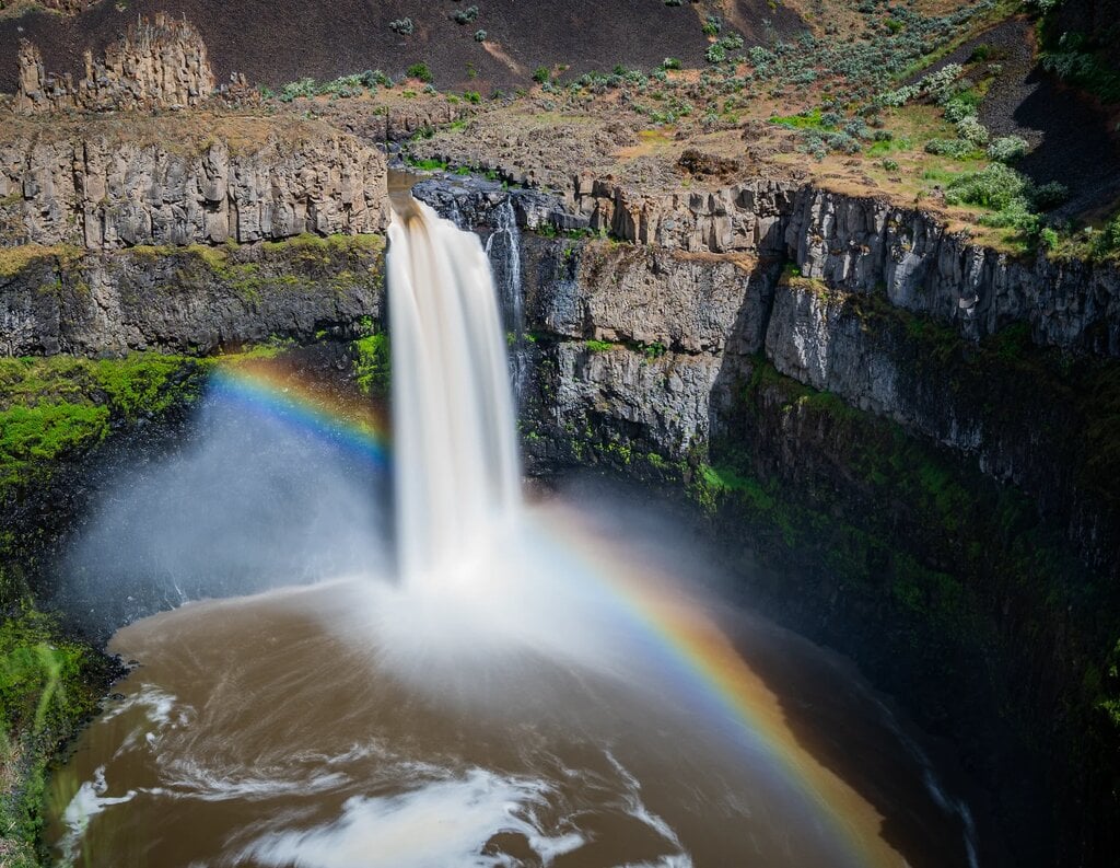 Palouse Falls State Park waterfall with rainbow in Eastern Washington