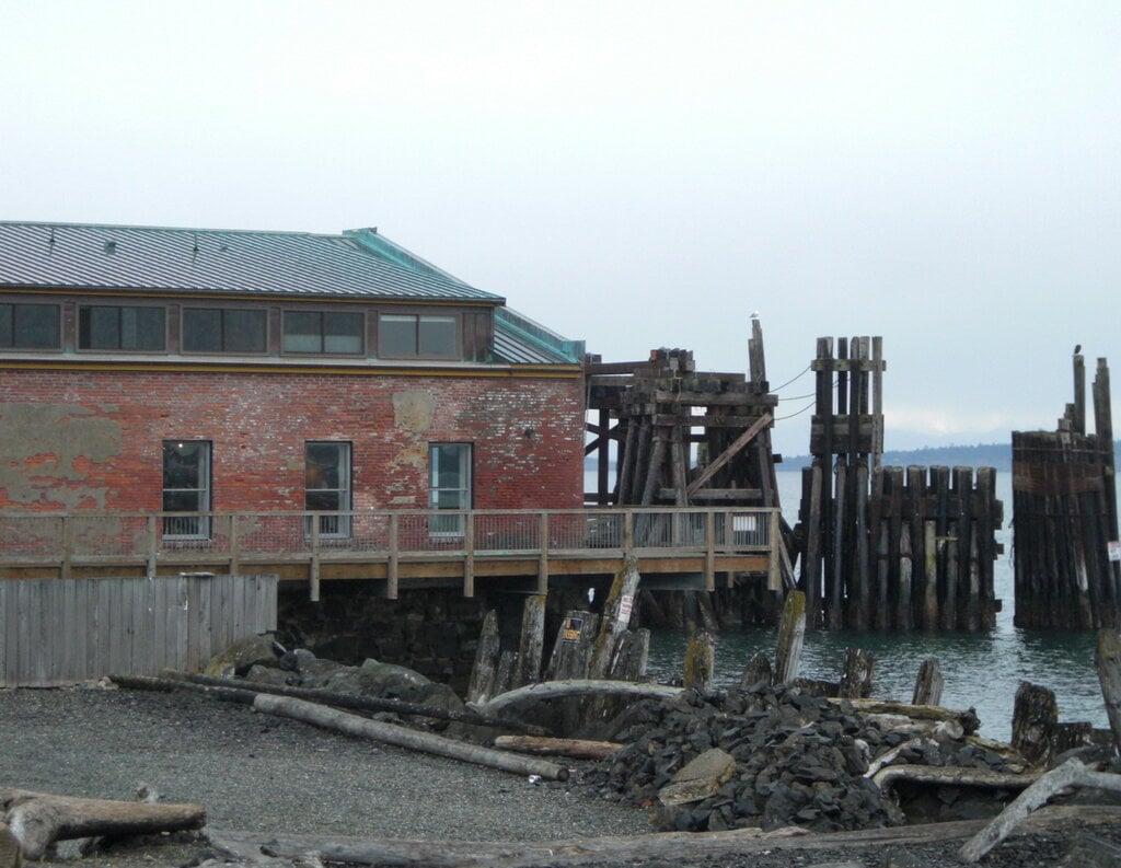Historic waterfront building and old pilings in Port Townsend, Washington