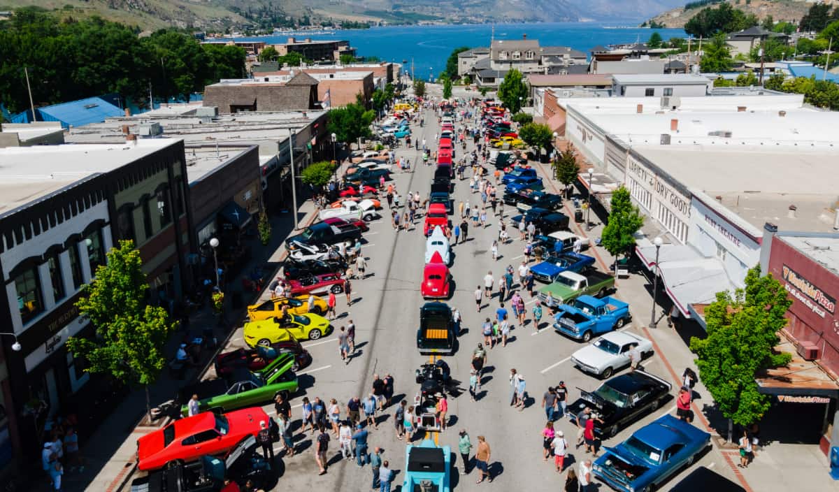 Aerial view of Cruizin Chelan car show on main street with Lake Chelan in the background