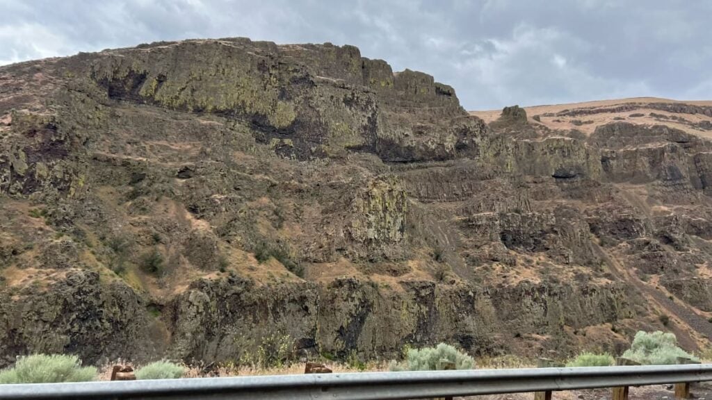 SR 821 winding through the Yakima River Canyon with basalt canyon walls