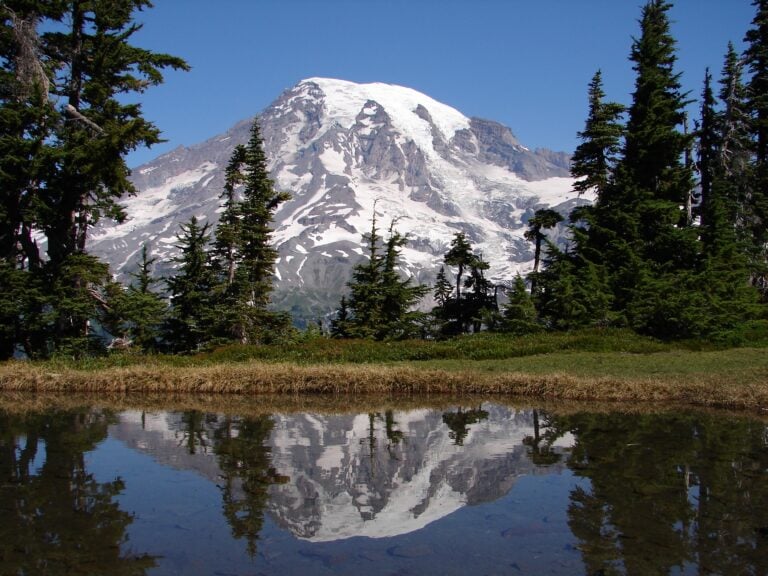 Mount Rainier reflected in a lake, one of many fun facts about Washington State