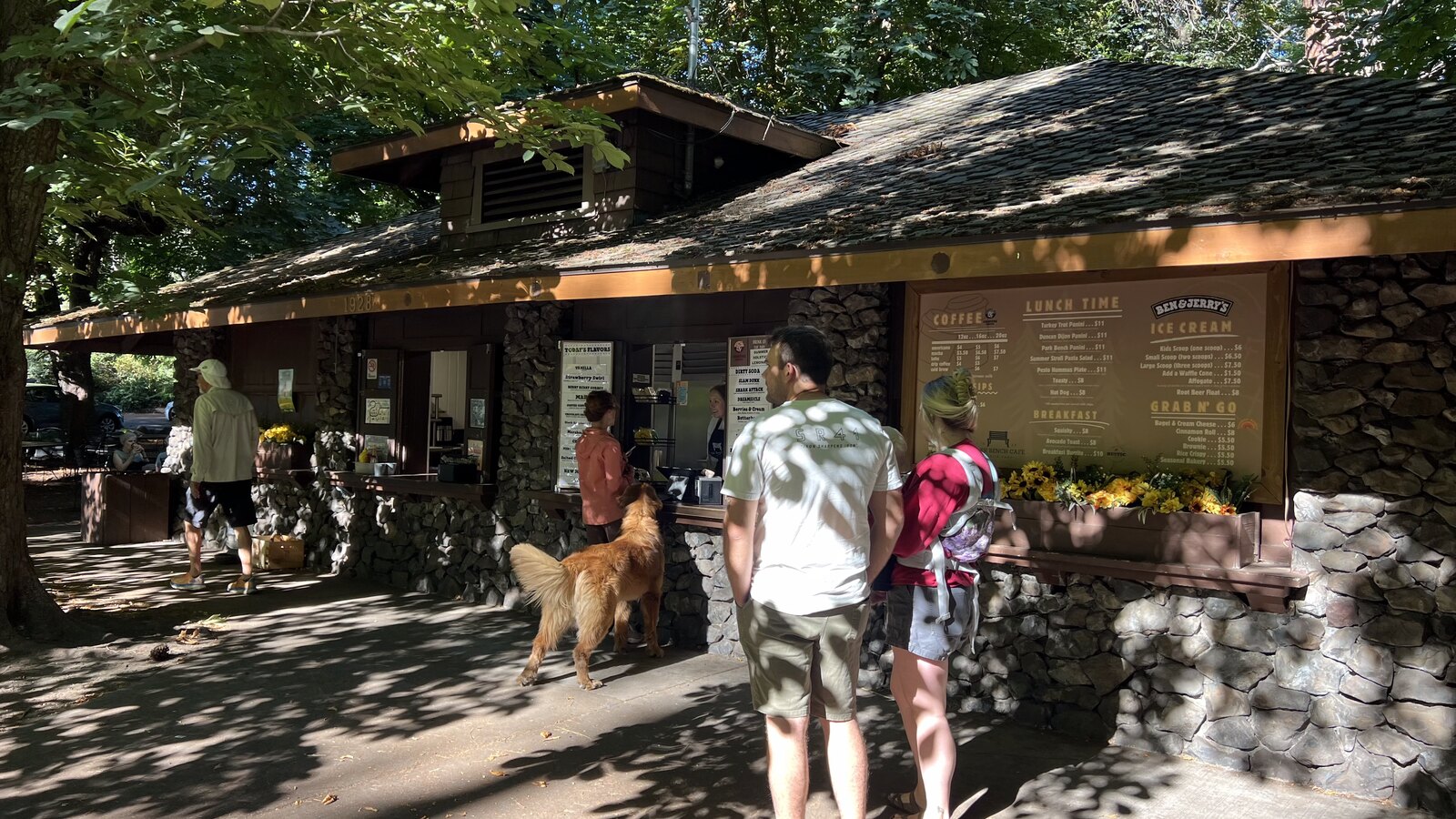 Visitors ordering at the Park Bench Cafe counter in Manito Park
