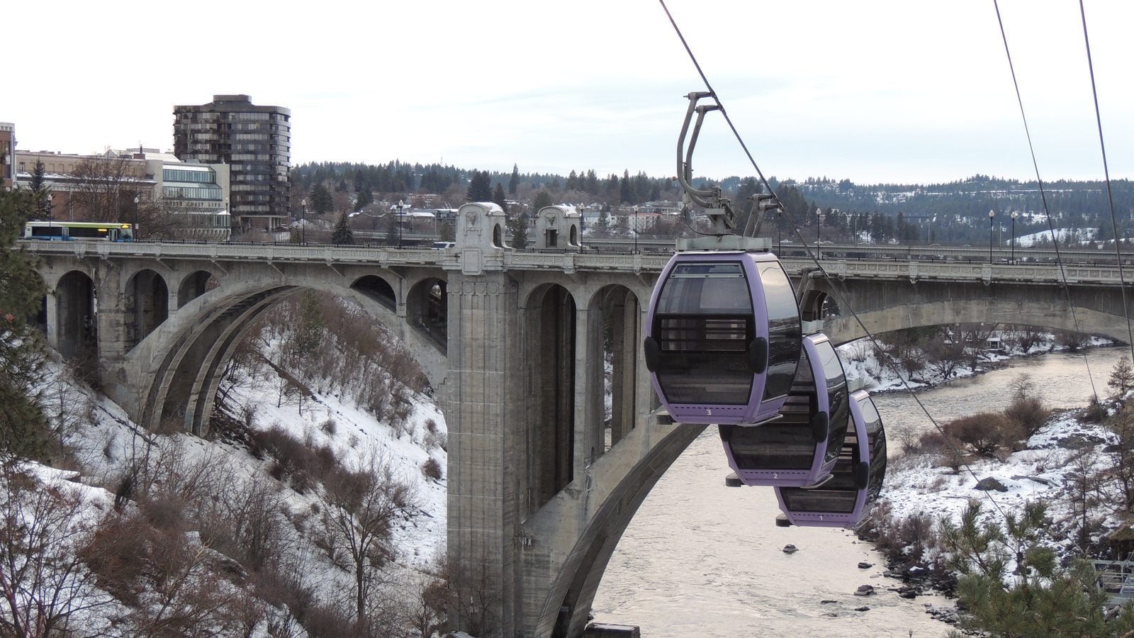 The Spokane Skyride gondolas over the Spokane River beside the Monroe Street Bridge, installed for the 1974 World's Fair