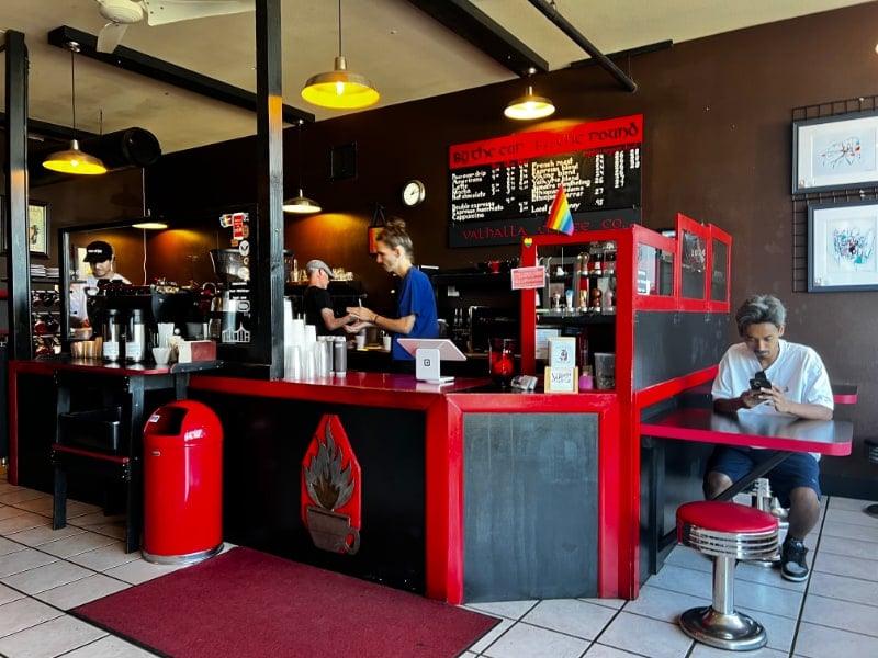 The red counter, espresso bar and menu board inside Valhalla Coffee Co. on Sixth Avenue in Tacoma