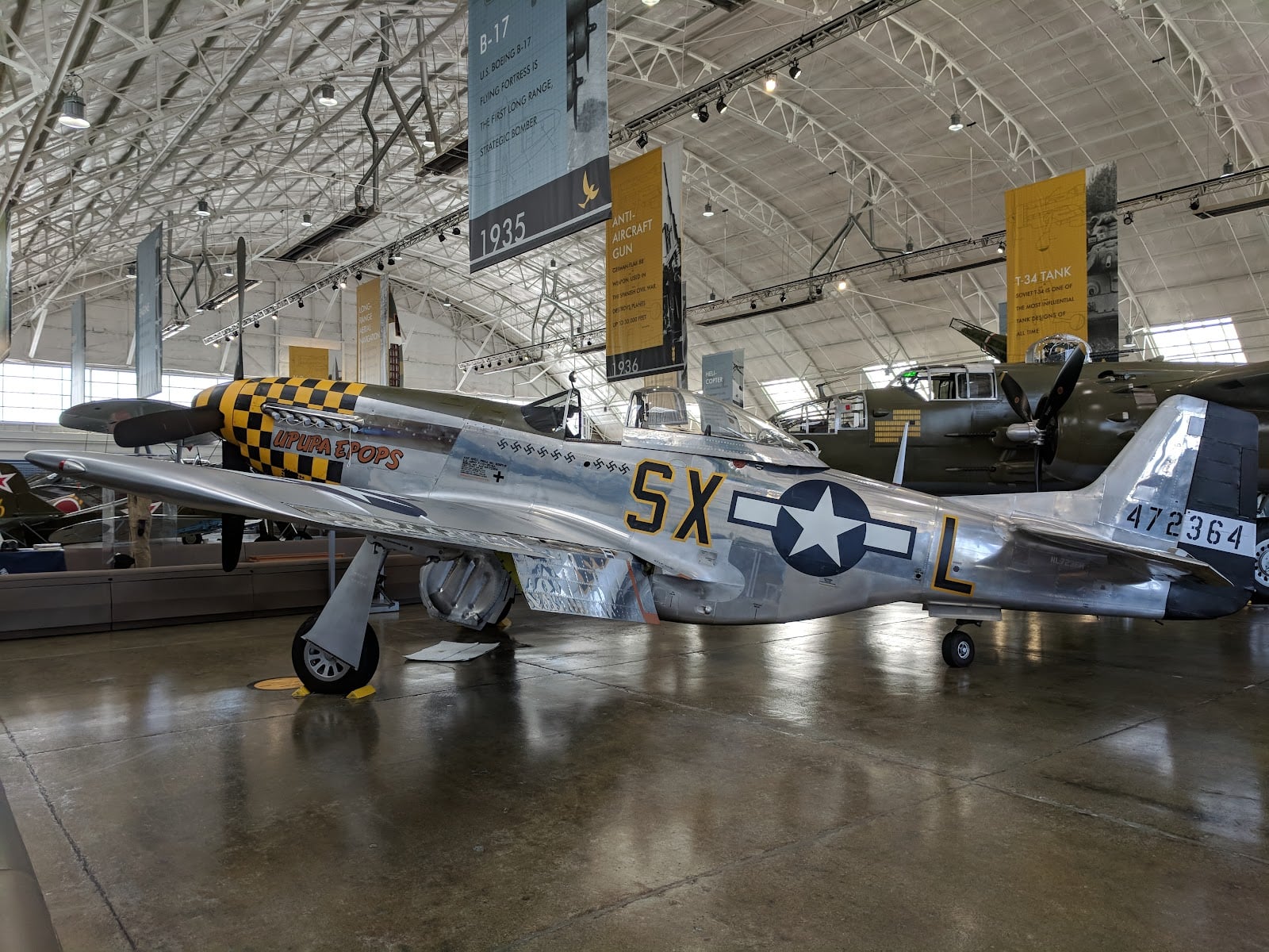 World War II fighter planes on display in the hangar at the Flying Heritage & Combat Armor Museum